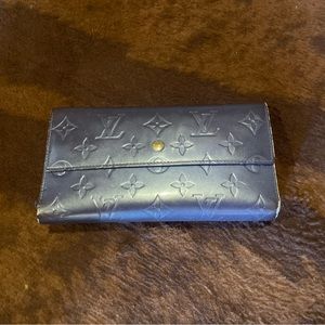 Authentic Louis Vuitton purple leather wallet